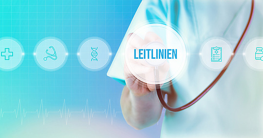Schriftzug Leitlinien mit Icons auf digitalem Interface